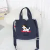 2025 Verano Nuevo Bolso de Lona de Hombro Lindo Bordado de Dibujos Animados Bolso Bandolera Casual Gran Capacidad Bolso Tote con Cordón