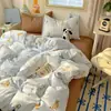 Set de Ropa de Cama para Bebé de Grado A Algodón Puro Cuatro Piezas Estilo Fresco Ins Algodón Lavado Dibujos Animados Lindos Estilo Crema Sábana Funda de Edredón