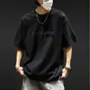2026 Verano Delgado Estilo Americano Casual Top para Hombre Cuello Redondo Estampado de Letras Manga Corta Camiseta Moderna Versátil Camisa de Media Manga