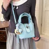Bolso de mano único y elegante para mujer 2026 verano nuevo bolso cubo casual de moda para ir al trabajo bolso cruzado simple para mujer