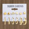 Conjunto de pendientes sencillos de moda de venta caliente transfronteriza entre Europa y Estados Unidos, temperamento femenino, personalidad que combina con todo, atmósfera exagerada, pendientes de alta gama.