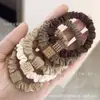 Nuevo Anillo de Intestino Grueso de Alta Elasticidad para Adulto Cuerda para el Cabello Cola de Caballo Alta Estuche de Cuero Anillo de Intestino Delgado Cuerda para la Cabeza Popular Simple Retro Goma