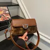 Bolsa Cuadrada Pequeña de Textura Simple Estilo Coreano Popular Transfronteriza para Mujer 2026 Nueva Moda Versátil para el Trabajo en Hombro Cruzado