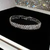 Pulseira Redonda Europeia e Americana Transfronteiriça com Borla e Cravejada de Diamantes, Pulseira Minimalista Moderna de Estilo Nicho com Design Único, Joia de Mão de Nicho