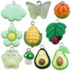 Colgante de resina verde aguacate gato bola de carne mariposa colgante llavero color crema DIY accesorios