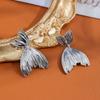 Aretes de Aguja de Plata S925 Estilo Metal Francés Cola de Pez Diseño de Personalidad Moda Temperamento Alto Sentido Estilo Frío Oreja Trendy