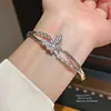 Pulsera con Cierre de Mosquetón de Mariposa y Cruz de Circonita, Bañada en Oro Real de 18K, Pulsera Exquisita y de Moda, Joyería de Lujo Ligero y de Alta Gama para Mujeres