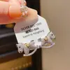 Pendientes de botón de plata con forma de poni y circonita de lujo, Pendientes únicos y creativos de nicho de alta gama, Pendientes minimalistas de estilo francés con temperamento
