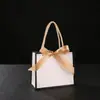 Bolsa de papel de mano con lazo, bolsa de regalo de boda, caja de dulces en blanco de Phnom Penh, bolsa de regalo pequeña transfronteriza