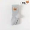 Calcetines para niños al por mayor transfronterizos primavera y otoño pantalones base para bebé medias para niños oso pequeño de dibujos animados medias de otoño para niñas