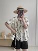 Camisa de manga corta con cuello redondo, cordones y lazo estampado para mujer, top holgado de algodón adelgazante de verano