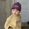 Gorro de Piel de Melón para Niños Otoño e Invierno Cálido Estilo Coreano Gorro de Lana Etiqueta de Costura Inglesa Gorro de Punto de Color Puro para Niños y Niñas