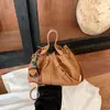 Bolsa de Cuero Suave con Cordón Estilo Coreano Nuevo Retro Bolso de Mano para Mujer Viaje Diario Nicho Gama Alta Bolso de Hombro Único