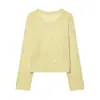 Venta al por mayor Primavera 2026 Nuevo Suéter de Punto Hueco de Cuello Redondo de Moda para Mujer Estilo Europeo y Americano Holgado para Mujer en Amarillo