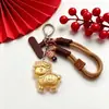 Año de la Oveja Llavero Dorado Rico Colgante para Bolso Colgante para Teléfono Set de Caja de Regalo Regalo de Negocios Recuerdo Al Por Mayor