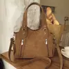 Bolsa de Mão Versátil Nova Outono e Inverno 2025 Bolsa de Ombro Feminina Bolsa Tote de Grande Capacidade para o Dia a Dia Bolsa Transversal Bolsa de Viagem