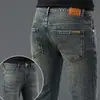Jeans skinny ajustados de marca italiana que no se decoloran para hombre, pantalones casuales lavados de alta gama color negro puro, nuevo modelo de otoño
