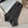 Calcetines holgados de tubo recto para mujer otoño invierno calcetines largos de punto retro calentadores de piernas adelgazantes versátiles calcetines de café a media pantorrilla