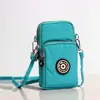 Bolsa diagonal para teléfono móvil al por mayor Nueva Bolsa pequeña para mujer Bolsa de tela para teléfono móvil bolsa vertical para cuello brazo muñeca monedero