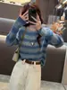Suéter de punto a rayas con bloques de color y degradado, una pieza otoñal elegante y cómoda con un look relajado y chic