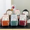 Nova Mochila Escolar de Nylon com Aparência Premium para Alunos do Ensino Fundamental, Mochila Gatinho Fofo, Mochila Casual de Grande Capacidade Atacado