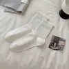 Calcetines de algodón puro para mujer, nuevo estilo de otoño, calcetines de encaje hasta la mitad de la pantorrilla, calcetines dulces JK con borde de burbujas, combinados con zapatos pequeños de cuero, calcetines blancos