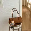 Bolso de axila retro minimalista francés transfronterizo para mujer, nuevo modelo 2026, estilo nicho con sensación de alta gama, bolso de mano de un solo hombro