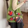 Bolsa de mão nova, elegante e versátil para 2026, perfeita para o trajeto de outono, apresentando um design de bolsa simples, textura tramada, grande capacidade e um padrão vazado.
