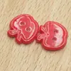 En stock color caramelo manzana botón irregular Ropa infantil botones decorativos de dibujos animados accesorios botón de resina de dos agujeros