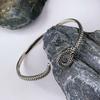 Pulsera de serpiente con aura dominante Europa y Estados Unidos venta caliente transfronteriza diseño de nicho plata chapada en plata con incrustaciones de circón verde pulsera serpiente enrollada pulsera pulsera