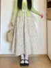 Falda retro de estilo japonés para mujer para primavera y otoño, nueva falda de paraguas de cintura alta en línea A para ir al trabajo, falda de longitud media que estiliza y favorece