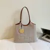 Bolsa Versátil Casual de Verano para Vacaciones Transfronteriza 2026 Tejida para Viajes Diarios Moda Simple Bolso de Hombro o Axila Tote