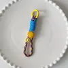 Adecuado para todo tipo de fundas de teléfono móvil, cordón corto para colgar, adornos colgantes, candado para llaves, mochila, cara sonriente de colores, cuerda para colgar con tarjeta