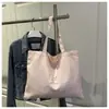 Bolso de lona a rayas estilo japonés de un solo hombro, nuevo modelo verano 2025, casual y versátil, bolsa de compras de gran capacidad para paseos relajados