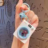 Llavero Creativo Luminoso para Lavadora Colgante Accesorios Dibujos Animados Simulación Alivio del Estrés Juguete Pequeño Colgante Regalo Pequeño Venta al por Mayor