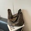 Exquisito bolso con estampado de leopardo estilo coreano para mujer, nuevo modelo primavera-verano 2026, bolso de gran capacidad, bolso de hombro estilo casual, bolso tote para el trabajo