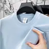 Camiseta de algodón puro de manga corta para verano para hombre, transpirable y de corte holgado, camiseta de cuello redondo para jóvenes y adultos de mediana edad, top versátil y moderno de color liso