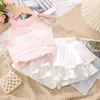 Conjunto de verano de estilo coreano para niñas 2026 nuevo moderno elegante chaleco de punto sin mangas y falda plisada conjunto de dos piezas para niños