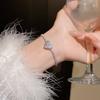 Pulsera de circonita de lujo ligero para mujer de alta calidad con diamantes completos super brillante personalidad pulsera versátil estilo frío nicho temperamento pulsera para mujer