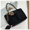 Bolso tote minimalista de alta gama para mujer, nuevo bolso retro de moda de gran capacidad para el trabajo, bolso de un solo hombro para madre e hija, moderno
