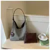 Bolso tejido de paja estilo francés 2026 nueva moda para ir al trabajo, bolsa de playa tote, bolso de hombro tejido a rayas para vacaciones para mujer