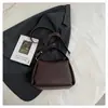 Bolsa Porta-Cigarros Macia Bolsa Casual Estilo Dumpling Francês Novo Estilo Primavera e Verão 2024 Simples Versátil Retro Bolsa de Ombro Transversal