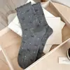 Calcetines lindos de cachorro de dibujos animados para mujer, calcetines de media pantorrilla para primavera y otoño, calcetines largos sin costuras serie gris ins, calcetines de algodón para mujer con lazo
