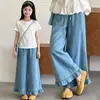 Pantalones vaqueros anchos de otoño para niña, nuevo estilo holgado, versátiles y elegantes con volantes, adecuados para niños mayores.
