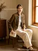 Venta caliente de AliExpress al por mayor transfronterizo 2026 nuevo estilo cuello alto textura de terciopelo estilo palacio retro chaqueta con botones