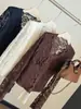 Elegante top de ganchillo con encaje y cuello en V para mujer, nueva colección de principios de otoño, sexy y chic, capa interior adelgazante, camiseta básica