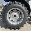 Tractor agrícola Lovo M1404-5X con cambio de marcha atrás/adelante, cabina con aire acondicionado, arado, labranza rotativa y retorno de paja al campo