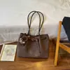 Bolso de Mujer de Alta Gama Nuevo Otoño/Invierno 2026 Color Sólido Nicho para Viajes Diarios Bolso de Hombro Único Moda Simple Bolso de Mano de Gran Capacidad