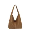 Bolso de gran capacidad a la moda para el día a día, nuevo bolso de hombro con estrellas estilo coreano 2026 para mujer, bolso tote simple y versátil, bolso de axila