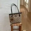 Bolsa de mão de grande capacidade para mulheres 2026 versão coreana nova moda versátil bolsa de ombro alto valor personalizada bolsa tote de bolinhas
